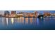 Waterfront dining and nightlife scene at the marina at night at 415 L Ambiance Dr # A701, Longboat Key, FL 34228