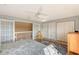 Large bedroom with double doors and ample closet space at 4230 Castlebridge Ln # 1821, Sarasota, FL 34238