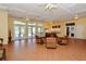 Spacious community room with tile floors and seating at 4230 Castlebridge Ln # 1821, Sarasota, FL 34238