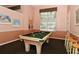 Relaxing game room with a pool table and comfortable seating at 4230 Castlebridge Ln # 1821, Sarasota, FL 34238