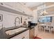Well-equipped kitchen, ample counter space, and stylish cabinetry at 4230 Castlebridge Ln # 1821, Sarasota, FL 34238
