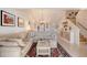 Bright living room featuring a comfortable sectional sofa and large windows at 4230 Castlebridge Ln # 1821, Sarasota, FL 34238