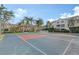 Multi-purpose sport court with basketball and shuffleboard at 4230 Castlebridge Ln # 1821, Sarasota, FL 34238