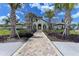 Stunning community clubhouse with a grand entrance and landscaping at 433 Tierra Verde Way, Bradenton, FL 34212