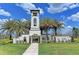 Inviting community entrance with a beautiful archway and landscaping at 433 Tierra Verde Way, Bradenton, FL 34212