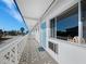 Building exterior with walkway and ocean view at 475 Benjamin Franklin Dr # 215, Sarasota, FL 34236