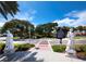 Statues and landscaping at a town square at 475 Benjamin Franklin Dr # 215, Sarasota, FL 34236