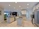 Spacious kitchen with an island and stainless steel appliances at 5522 69Th E Pl, Ellenton, FL 34222