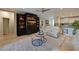 Living area showcasing a large entertainment center and comfortable seating at 5522 69Th E Pl, Ellenton, FL 34222