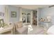 Bedroom with a desk and private access to the backyard at 6005 Midnight Pass Rd # N8, Sarasota, FL 34242