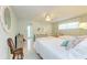 Guest bedroom with two twin beds and a light and airy feel at 6005 Midnight Pass Rd # N8, Sarasota, FL 34242