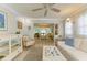 View of the dining room from the living area, featuring a table and chairs at 6005 Midnight Pass Rd # N8, Sarasota, FL 34242