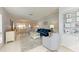 Bright and airy living room with ample seating and large windows at 6005 Midnight Pass Rd # N8, Sarasota, FL 34242