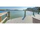 Private wooden dock with water access at 6005 Midnight Pass Rd # N8, Sarasota, FL 34242