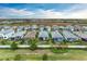 Aerial community view showcasing homes and landscape at 6273 Winding Pine Dr, Nokomis, FL 34275