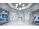 Elegant marble hallway in community clubhouse at 6273 Winding Pine Dr, Nokomis, FL 34275