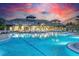 Relaxing pool area with ample lounge chairs at 6273 Winding Pine Dr, Nokomis, FL 34275