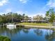 Waterfront home with private dock and lush landscaping at 7056 Hawks Harbor Cir, Bradenton, FL 34207
