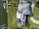 Bird's-eye view of waterfront home with private dock and boat at 7056 Hawks Harbor Cir, Bradenton, FL 34207