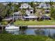 Waterfront home with private dock and lush landscaping at 7056 Hawks Harbor Cir, Bradenton, FL 34207