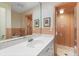 Bathroom with peach tile and updated vanity at 7056 Hawks Harbor Cir, Bradenton, FL 34207