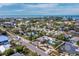 Aerial view of property and surrounding neighborhood near the water at 711 Russell St, Longboat Key, FL 34228