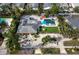 Aerial view of the house and surrounding landscape at 711 Russell St, Longboat Key, FL 34228