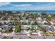 Aerial view showcasing home, pool, and surrounding neighborhood at 711 Russell St, Longboat Key, FL 34228