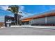 Modern restaurant exterior with dark stone and wood accents at 711 Russell St, Longboat Key, FL 34228