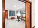 Home office with a desk and view into the bedroom at 711 Russell St, Longboat Key, FL 34228
