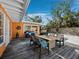 Relaxing patio area with outdoor seating and a wooden deck at 711 Russell St, Longboat Key, FL 34228