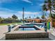 Expansive pool with spa and comfortable lounge chairs at 711 Russell St, Longboat Key, FL 34228