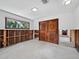 Room under construction with exposed framing and new flooring at 711 Russell St, Longboat Key, FL 34228
