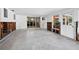Room under construction with exposed framing and new flooring at 711 Russell St, Longboat Key, FL 34228