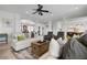 Open-concept living room features beautiful decorative pillars and seamless connection to the kitchen at 718 Key Royale Dr, Holmes Beach, FL 34217