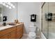Well-appointed bathroom with granite countertop, updated vanity, and shower at 7946 Tybee Ct, University Park, FL 34201