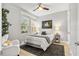 Bright bedroom with a comfortable bed and stylish decor at 7946 Tybee Ct, University Park, FL 34201