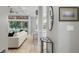 Bright entryway with view into living room and kitchen at 7946 Tybee Ct, University Park, FL 34201