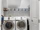 Clean laundry room with side-by-side washer and dryer at 7946 Tybee Ct, University Park, FL 34201