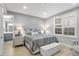 Spacious bedroom with plush bed and private access to the bathroom at 7946 Tybee Ct, University Park, FL 34201