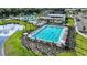 Resort-style pool, clubhouse, and expansive green spaces at 8144 Moonbeam Ave, Sarasota, FL 34241