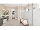 Elegant bathroom with large walk-in shower and double vanity at 8144 Moonbeam Ave, Sarasota, FL 34241