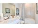 Bathroom with a shower/tub combo and modern vanity at 8144 Moonbeam Ave, Sarasota, FL 34241