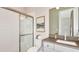 Bathroom with a walk in shower and modern vanity at 8144 Moonbeam Ave, Sarasota, FL 34241
