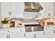 Bright kitchen with stainless steel appliances and a marble backsplash at 8144 Moonbeam Ave, Sarasota, FL 34241