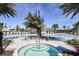 Relaxing spa and pool area with lounge chairs at 8144 Moonbeam Ave, Sarasota, FL 34241