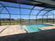 Screened pool and spa with lake view at 8528 Beechlake Ct, Sarasota, FL 34240