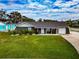 Newly renovated home with a large backyard and updated landscaping at 905 69Th Nw St, Bradenton, FL 34209