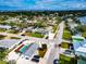 Wide shot of the house and neighborhood, showing the location by the water at 905 69Th Nw St, Bradenton, FL 34209