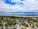 Aerial view showcasing a single Gathering home and surrounding neighborhood, near the water at 905 69Th Nw St, Bradenton, FL 34209